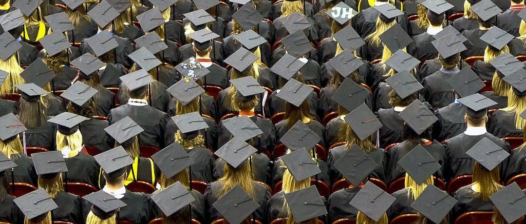 Students graduating with a college degree